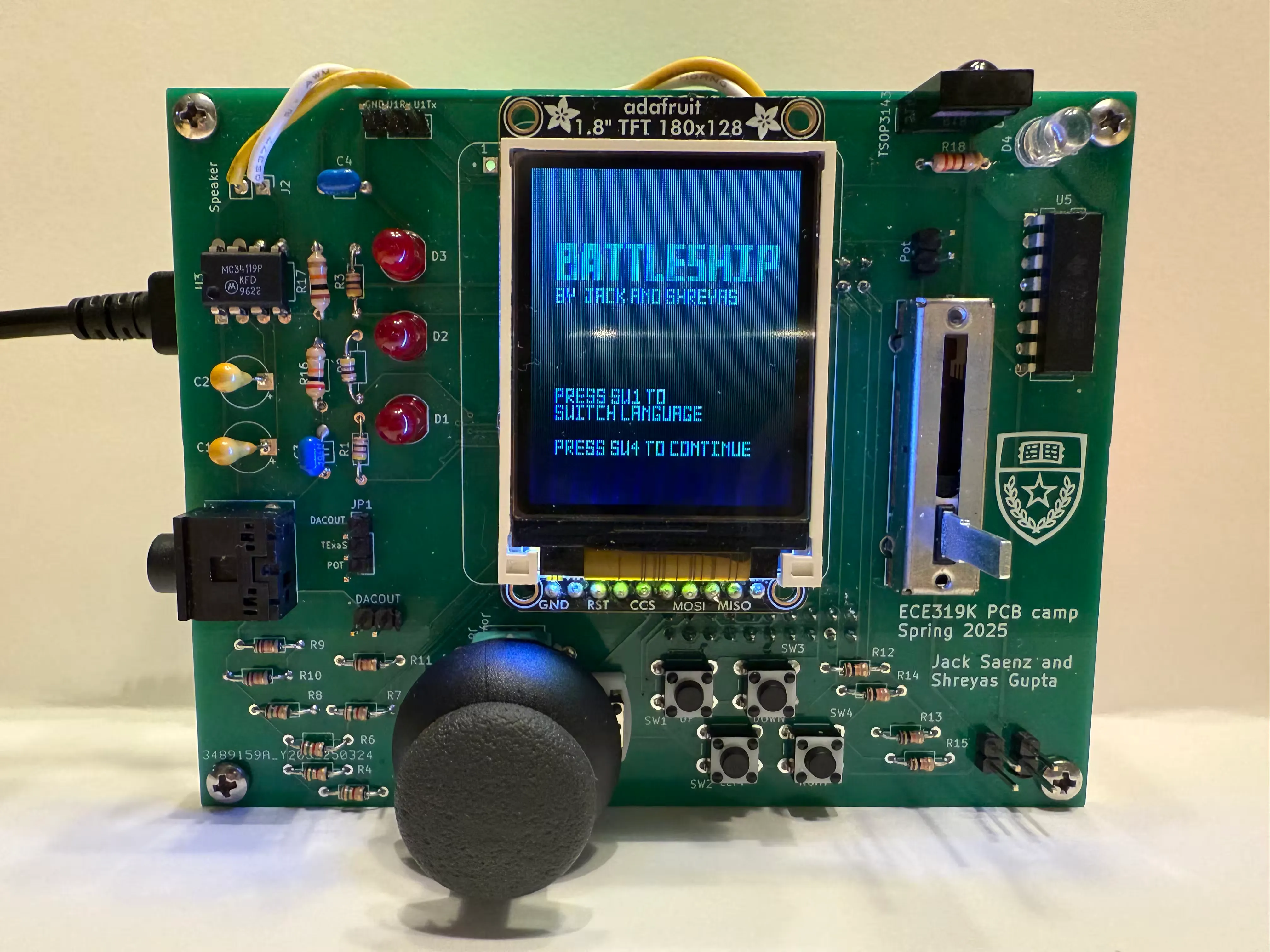 Battleship project PCB, showing the screen, controls, and various components.
